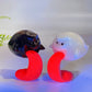 2.3" Black Obsidian White Jade Ghost Carving with UV Reactive Honeycomb Calcite Protruding Tongue