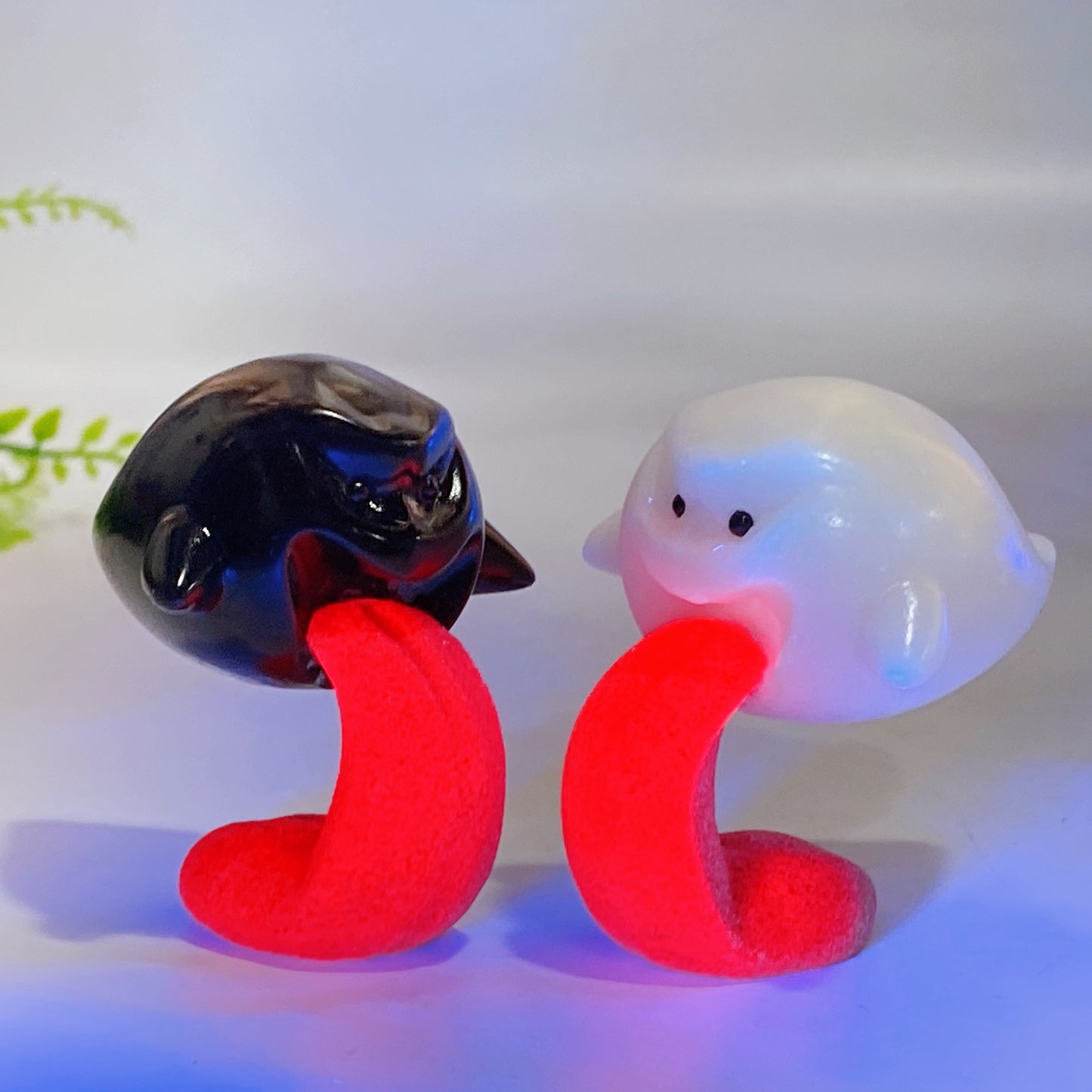 2.3" Black Obsidian White Jade Ghost Carving with UV Reactive Honeycomb Calcite Protruding Tongue